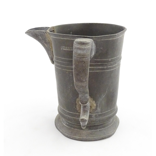 1309 - A 19thC pewter quart tankard with pouring spout, the base inscribed 'New Falcon Gravesend', together... 