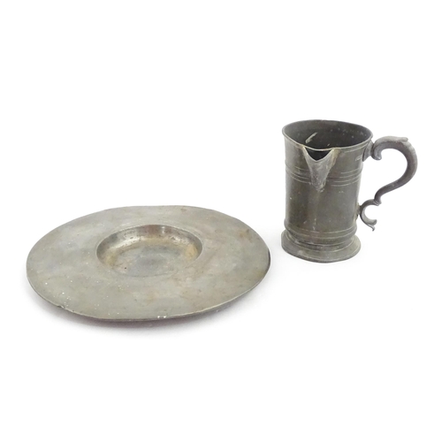 1309 - A 19thC pewter quart tankard with pouring spout, the base inscribed 'New Falcon Gravesend', together... 