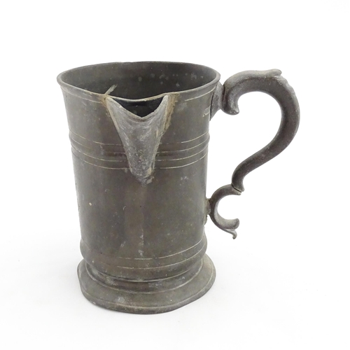 1309 - A 19thC pewter quart tankard with pouring spout, the base inscribed 'New Falcon Gravesend', together... 