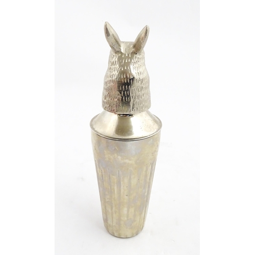 1313 - A late 20th / early 21stC novelty cocktail shaker with hare / rabbit formed lid. Approx. 12