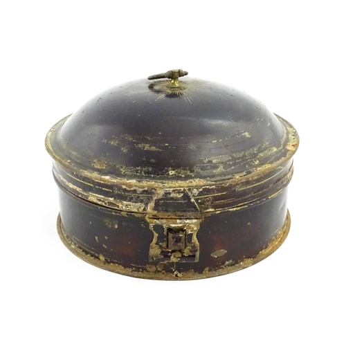 1326 - A Victorian toleware spice box of circular form with gilt detail, opening to reveal six sections wit... 