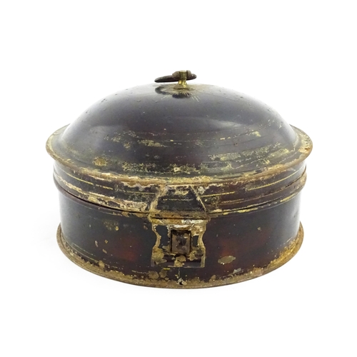 1326 - A Victorian toleware spice box of circular form with gilt detail, opening to reveal six sections wit... 