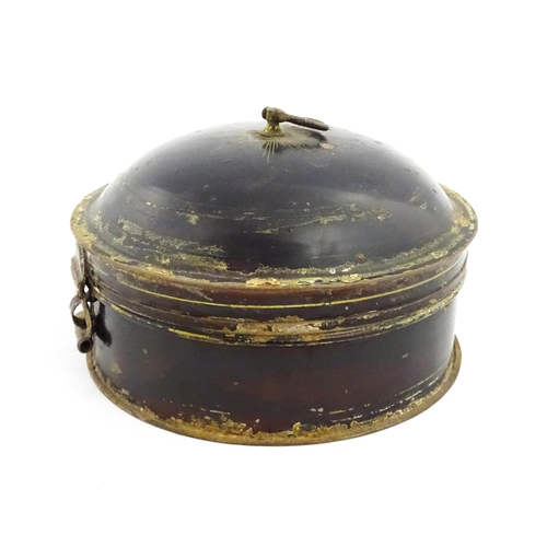 1326 - A Victorian toleware spice box of circular form with gilt detail, opening to reveal six sections wit... 