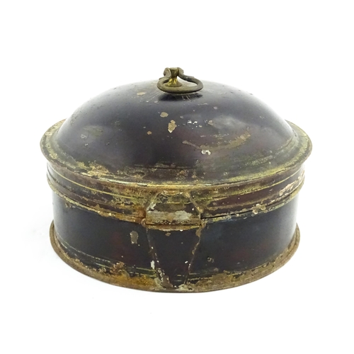 1326 - A Victorian toleware spice box of circular form with gilt detail, opening to reveal six sections wit... 