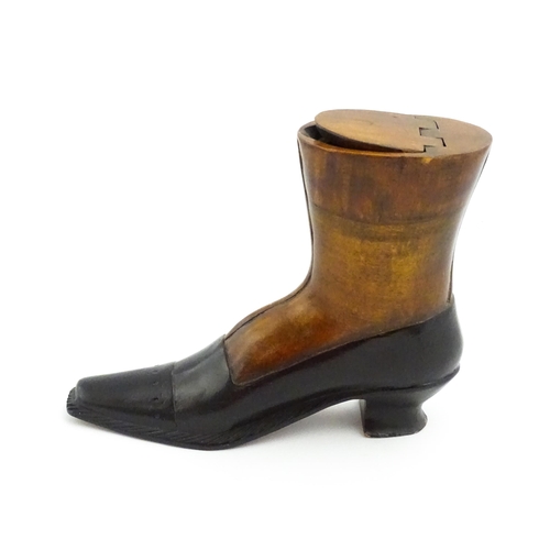 1346 - Treen : A large 20thC shoe snuff box / table snuff of boot form with hinged lid and carved decoratio... 