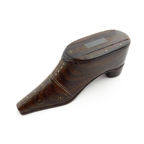 1349 - Treen : A 19thC shoe snuff box with sliding lid and inlaid brass studwork decoration. Approx. 4 1/4