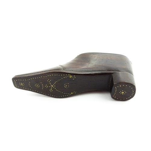 1349 - Treen : A 19thC shoe snuff box with sliding lid and inlaid brass studwork decoration. Approx. 4 1/4