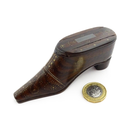 1349 - Treen : A 19thC shoe snuff box with sliding lid and inlaid brass studwork decoration. Approx. 4 1/4