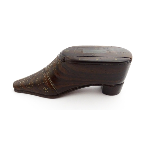 1349 - Treen : A 19thC shoe snuff box with sliding lid and inlaid brass studwork decoration. Approx. 4 1/4