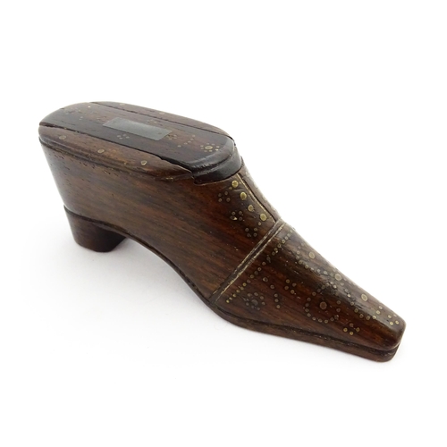 1349 - Treen : A 19thC shoe snuff box with sliding lid and inlaid brass studwork decoration. Approx. 4 1/4