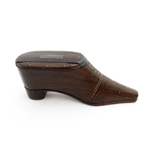 1349 - Treen : A 19thC shoe snuff box with sliding lid and inlaid brass studwork decoration. Approx. 4 1/4