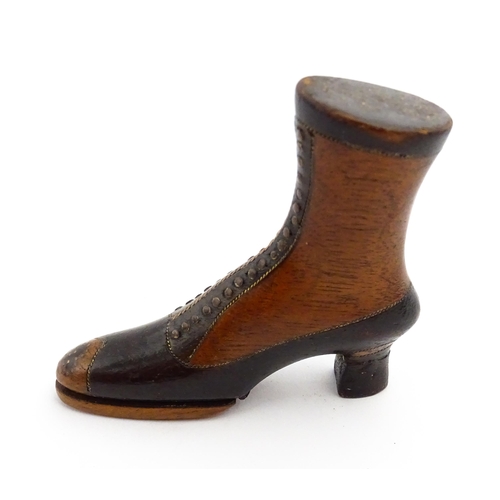 1350 - Treen : A 19thC shoe snuff box of heeled boot form with hinged lid to toe of boot and having studwor... 