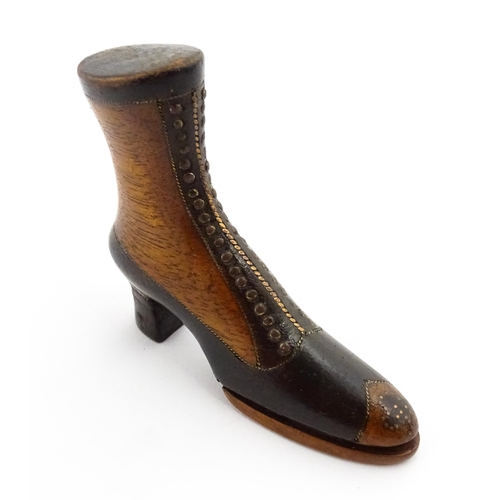 1350 - Treen : A 19thC shoe snuff box of heeled boot form with hinged lid to toe of boot and having studwor... 