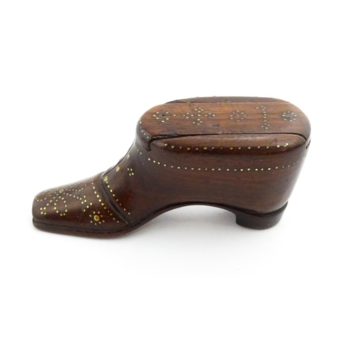 1351 - Treen : A 19thC shoe snuff box with sliding lid and inlaid brass studwork decoration. Approx. 3 1/2