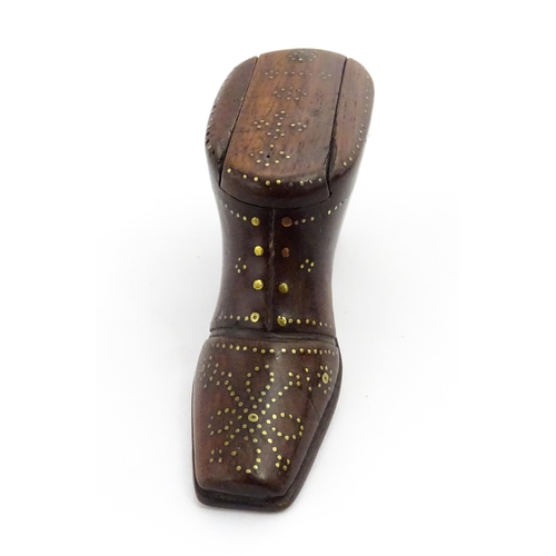 1351 - Treen : A 19thC shoe snuff box with sliding lid and inlaid brass studwork decoration. Approx. 3 1/2