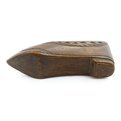 1352 - Treen : A large 19thC shoe snuff box with sliding lid, and chip carved decoration with foliate motif... 