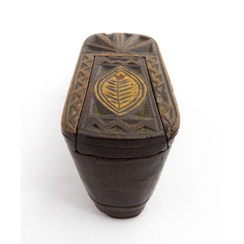 1352 - Treen : A large 19thC shoe snuff box with sliding lid, and chip carved decoration with foliate motif... 