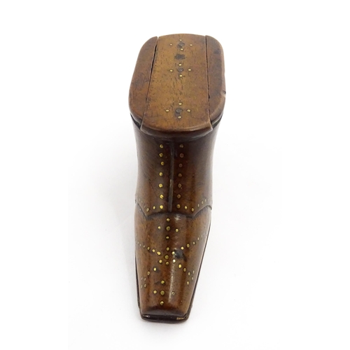 1353 - Treen : A 19thC shoe snuff box with sliding lid and inlaid brass studwork decoration. Approx. 3 3/4