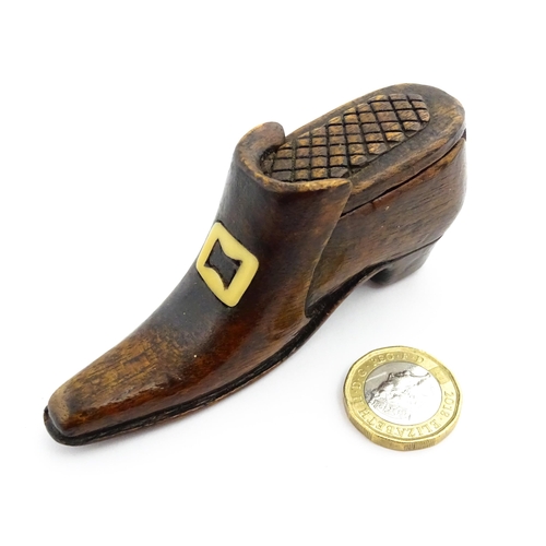 1356 - Treen : A 19thC shoe snuff box with carved sliding lid and inlaid buckle decoration. Approx. 3 3/4