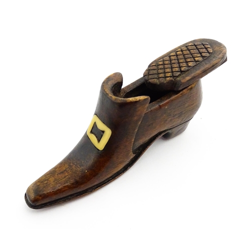 1356 - Treen : A 19thC shoe snuff box with carved sliding lid and inlaid buckle decoration. Approx. 3 3/4