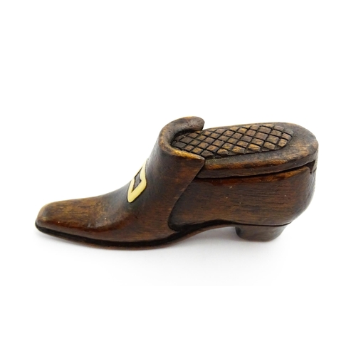 1356 - Treen : A 19thC shoe snuff box with carved sliding lid and inlaid buckle decoration. Approx. 3 3/4