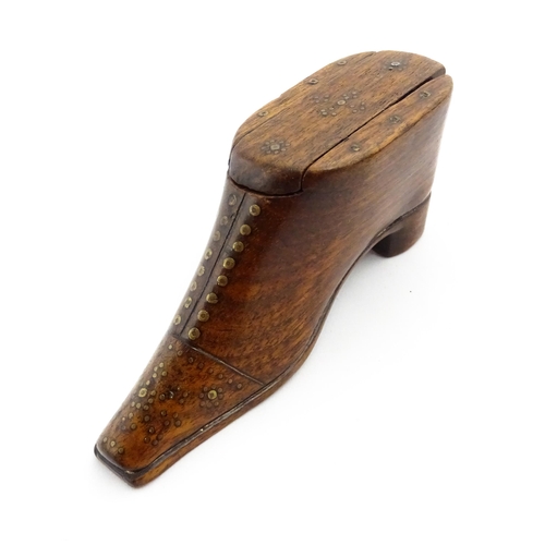 1357 - Treen : A 19thC shoe snuff box with sliding lid and inlaid brass studwork decoration. Approx. 3 3/4