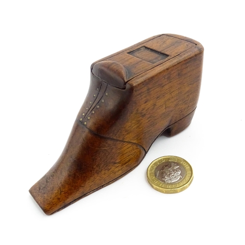 1358 - Treen : A 19thC shoe snuff box with sliding lid and brass studwork, and incised decoration. Approx. ... 