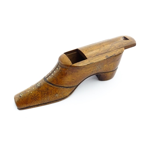 1361 - Treen : A large late 19thC shoe snuff box / table snuff with sliding lid and inlaid brass studwork d... 