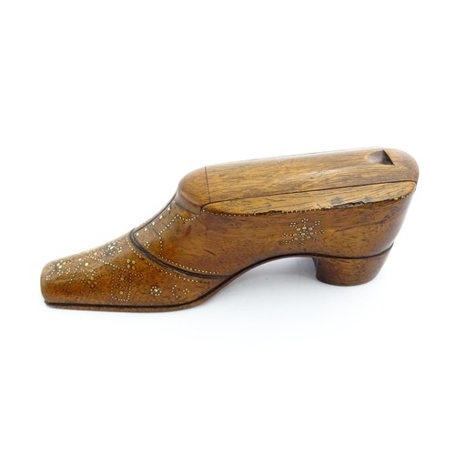 1361 - Treen : A large late 19thC shoe snuff box / table snuff with sliding lid and inlaid brass studwork d... 