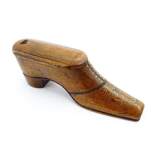 1361 - Treen : A large late 19thC shoe snuff box / table snuff with sliding lid and inlaid brass studwork d... 