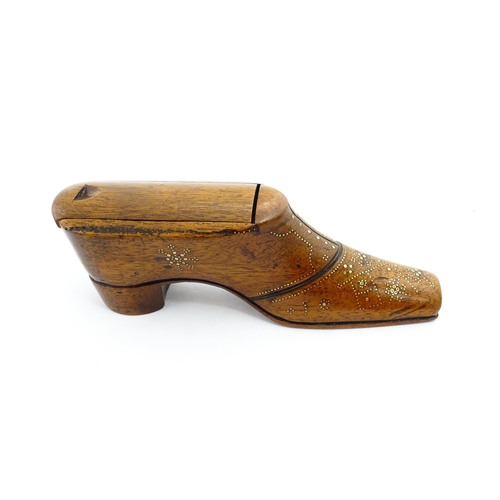 1361 - Treen : A large late 19thC shoe snuff box / table snuff with sliding lid and inlaid brass studwork d... 