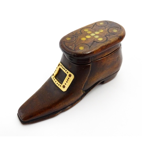 1362 - Treen : A 19thC shoe snuff box with sliding lid, applied buckle detail and inlaid roundel detail to ... 