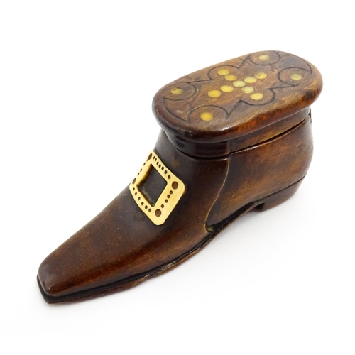 1362 - Treen : A 19thC shoe snuff box with sliding lid, applied buckle detail and inlaid roundel detail to ... 