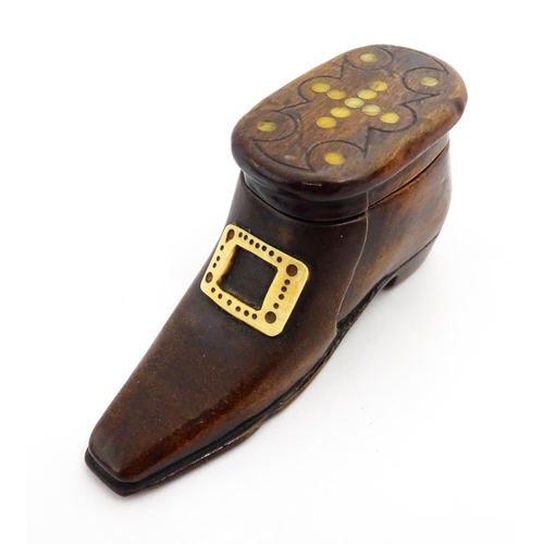 1362 - Treen : A 19thC shoe snuff box with sliding lid, applied buckle detail and inlaid roundel detail to ... 