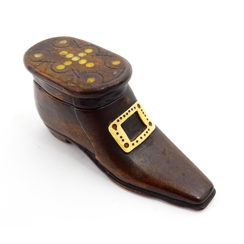 1362 - Treen : A 19thC shoe snuff box with sliding lid, applied buckle detail and inlaid roundel detail to ... 