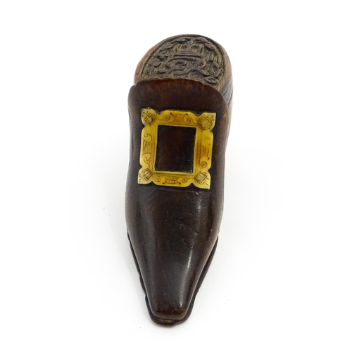 1363 - Treen : An early 20thC shoe snuff box of boot form with sliding lid, applied penwork buckle detail a... 