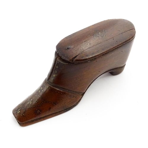 1365 - Treen : A 19thC shoe snuff box with sliding lid and inlaid brass studwork decoration. Approx. 3 3/4