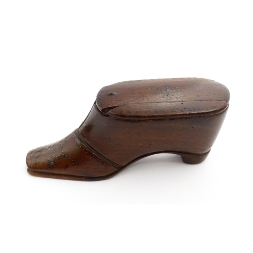 1365 - Treen : A 19thC shoe snuff box with sliding lid and inlaid brass studwork decoration. Approx. 3 3/4