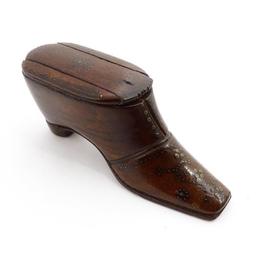 1365 - Treen : A 19thC shoe snuff box with sliding lid and inlaid brass studwork decoration. Approx. 3 3/4