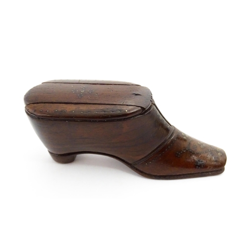 1365 - Treen : A 19thC shoe snuff box with sliding lid and inlaid brass studwork decoration. Approx. 3 3/4