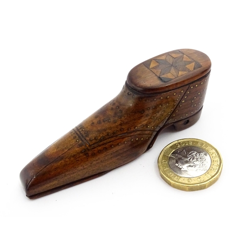 1366 - Treen : A 19thC unusual shoe snuff box with marquetry detail to top and inlaid brass studwork decora... 