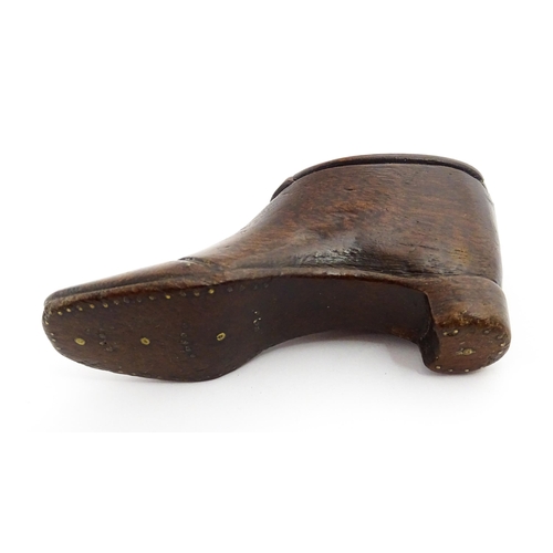 1367 - Treen : A 19thC shoe snuff box with sliding lid and inlaid brass studwork decoration. Approx. 3 1/2