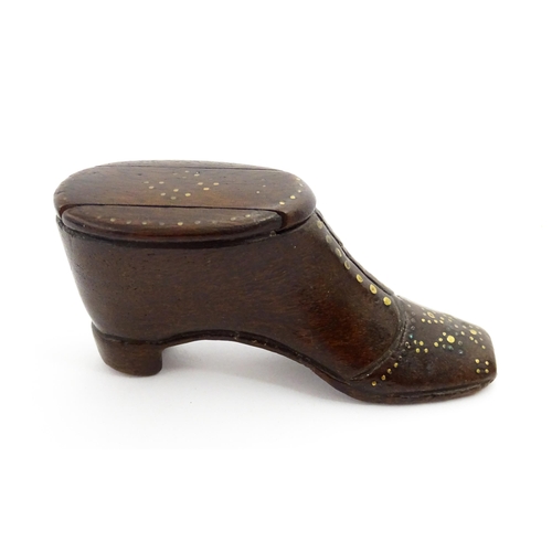 1367 - Treen : A 19thC shoe snuff box with sliding lid and inlaid brass studwork decoration. Approx. 3 1/2