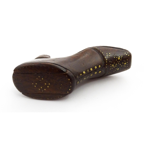 1367 - Treen : A 19thC shoe snuff box with sliding lid and inlaid brass studwork decoration. Approx. 3 1/2