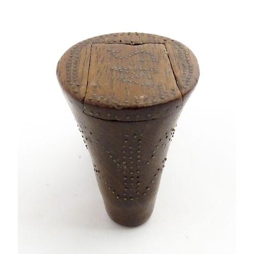 1368 - Treen : A 19thC shoe snuff box of boot form with inlaid brass studwork decoration, the sliding lid w... 