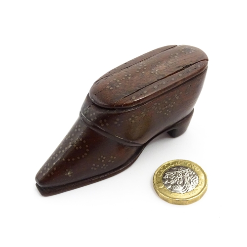 1372 - Treen : A 19thC shoe snuff box with sliding lid and inlaid brass studwork decoration. Approx. 3 1/4