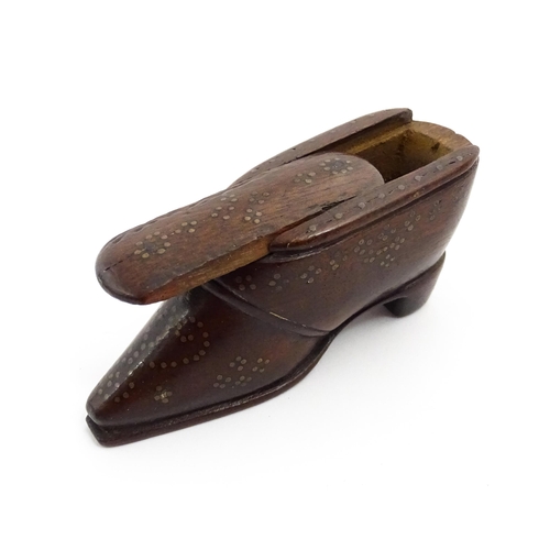 1372 - Treen : A 19thC shoe snuff box with sliding lid and inlaid brass studwork decoration. Approx. 3 1/4