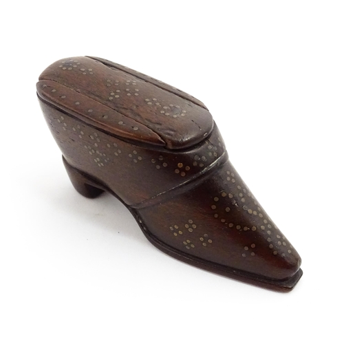 1372 - Treen : A 19thC shoe snuff box with sliding lid and inlaid brass studwork decoration. Approx. 3 1/4