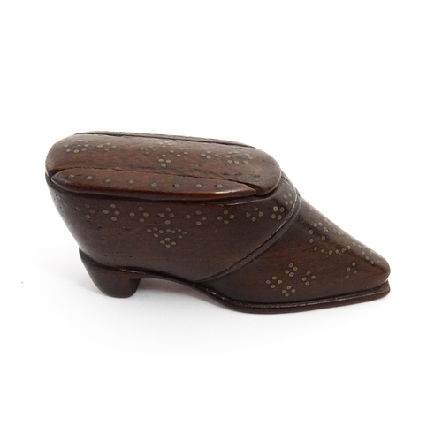 1372 - Treen : A 19thC shoe snuff box with sliding lid and inlaid brass studwork decoration. Approx. 3 1/4