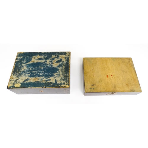 1176A - Toys: Two 20thC boxes with inlaid decoration containing assorted gaming components to include mother... 